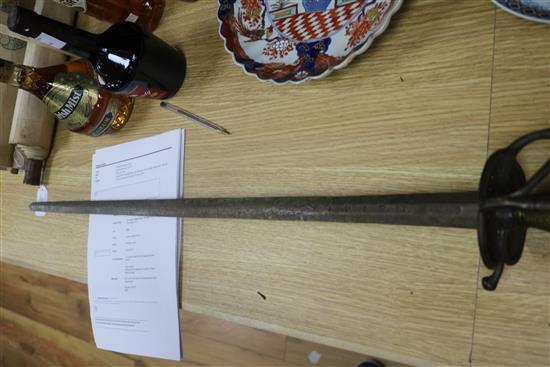 A Turkish sidearm and a cagework hilted sword